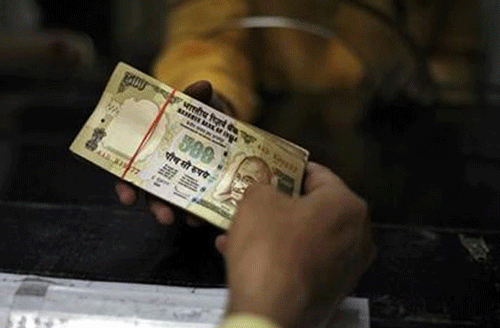 Rupee trims its early losses vs dollar, still down by 23 paise