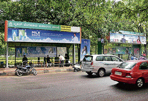 Worth the trouble:  Bus shelters opposite Chinnaswamy Stadium and JC Road (below) will soon be shifted.