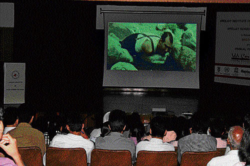 All eyes: Students participate in a film screening during the festival 'We Care'.