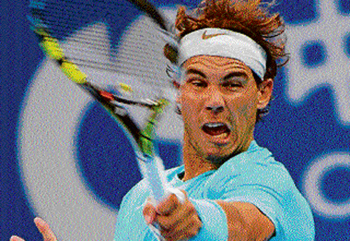 Brute force: Rafael Nadal whips a forehand return against Santiago&#8200;Giraldo in the China Open. AFP