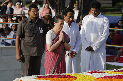 Chief of India's ruling Congress party Sonia pays homage at the Mahatma Gandhi memorial, on the 144th birth anniversary of Gandhi at Rajghat in New Delhi Reuters Image
