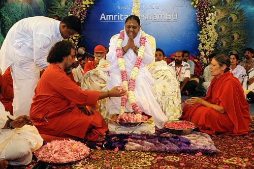 spiritual leader Mata Amritanandamayi attends celebrations marking her 60th birthday at Vallikavu, near Kollam, Kerala Ap File Photo
