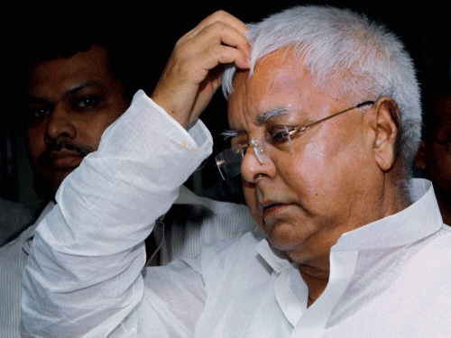 **FILE** File photo of Rashtriya Janata Dal President, Lalu Prasad who was sentenced to 5 years in jail in a fodder scam case by a special CBI court in Ranchi on Thursday. PTI Photo