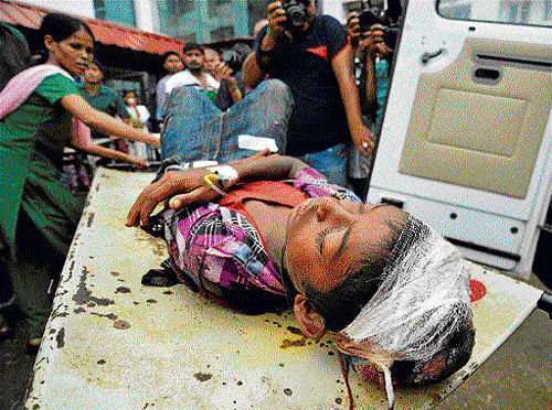 An injured boy is being shifted to Guwahati Medical College Hospital after an accident that claimed lives of 31 people in Barpeta, Assam, on Thursday. PTI