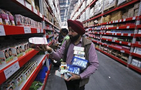 A customer shops at a Best Price Modern Wholesale store, a joint venture of Wal-Mart Stores Inc and Bharti Enterprises, at Zirakpur in Punjab. Reuters