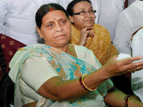 RJD leader and former Bihar chief minister Rabri Devi with senior party leaders during a meeting at 10 Circular Road in Patna on Sunday. PTI photo
