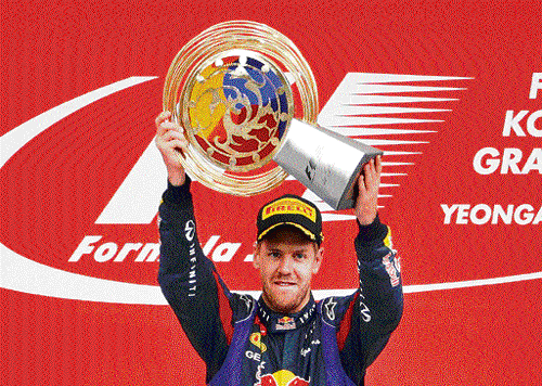 One more win Sebastian Vettel with the trophy after winning the Korean Grand Prix in Yeongam on Sunday. AFP
