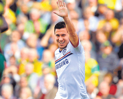 super sub Chelsea' Eden Hazard celebrates after scoring against Norwich City on Sunday. afp