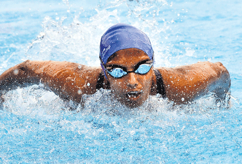 on song: Bangalore's Shraddha Sudhir powers to the gold in Dasara Games swimming on Sunday. dh photo/ prashanth hg