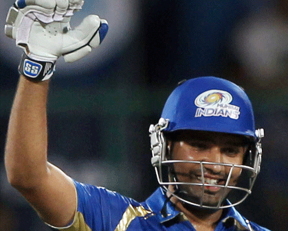 Mumbai Indians' Rohit Sharma celebrates his team's victory over Perth Scorchers during the Champions League T20 match at Ferozshah Kotla in New Delhi on Wednesday. PTI Photo