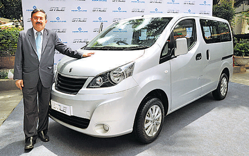 Ashok Leyland Executive Director (LCV & Defence) Nitin Seth launches the company's new MPV 'Stile' in Bangalore on Tuesday. DH Photo