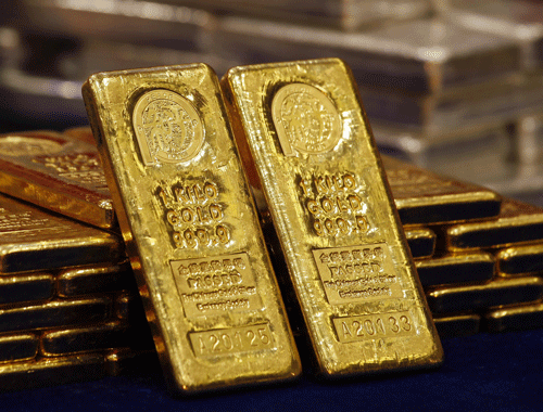One-kg 24K gold bars are displayed at the Chinese Gold and Silver Exchange Society in Hong Kong. Reuters File Photto