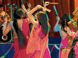 Gujarati girls love the channiya cholis while the men sport the kediyas for Garba and Dandiya.