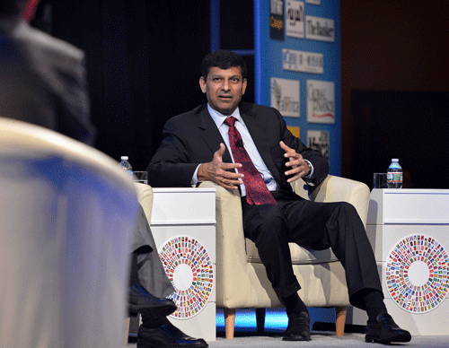 Reserve Bank of India Gov. Raghuram Rajan answers a question during a CNN Debate on the Global Economy, along with other bank governors and finance ministers, as part of the IMF and World Bank's 2013 Annual Fall Meetings, in Washington, October 10, 2013. REUTERS