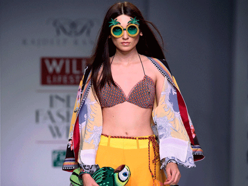 A Model displays creation of designer Rajdeep Ranawat during the Wills Lifestyle India Fashion Week - Spring Summer 2014, in New Delhi on Friday. PTI Photo