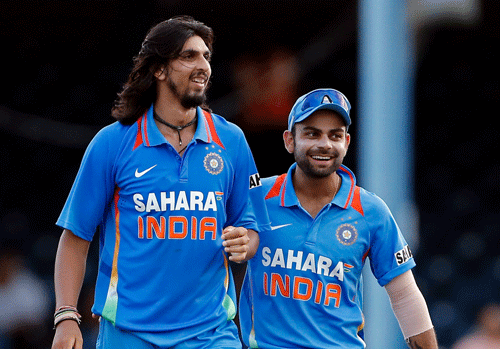 Virat Kohli, right, and bowler Ishant Sharma AP File Photo