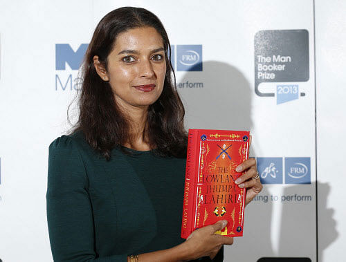 Man Booker prize shortlist nominee Jhumpa Lahiri poses with her book 'The Lowland' during a photocall at the Southbank Centre in London Reuters Image