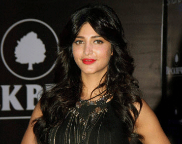 Actress Shruti Haasan poses for the photographers during a promotional event in Mumbai on Friday. PTI Photo