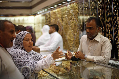 Muslim pilgrims shop at a jewelry store ahead of the annual haj pilgrimage, in the holy city of Mecca. Reuters Image