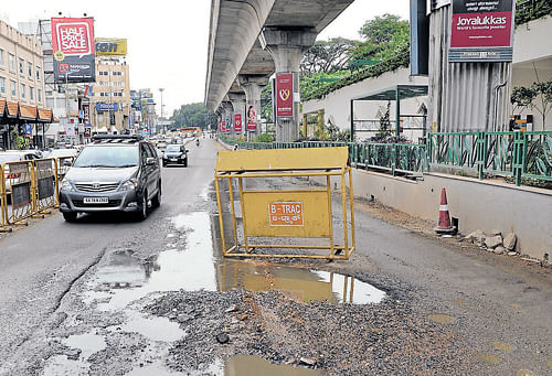 awful stretch: While the roads beneath the Metro streches have been badly damaged,  the BMRCL is now caught on the wrong foot for laying humps unscientifically. dh Photo