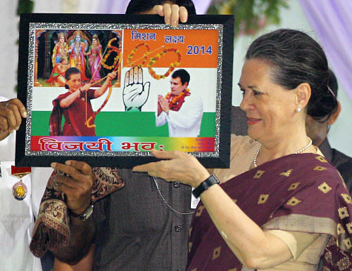 UPA Chairperson Sonia Gandhi holds a memento during Dussehra celebrations at Ram Lila Grounds in New Delhi on Sunday. PTI Photo