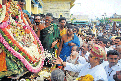 A sea of devotees throng car festival atop Chamundi Hill