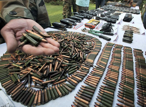 Army displaying arms and ammunition recovered from militants who were killed in recent encounters while trying to infiltrate in the Keran Sector of Jammu and Kashmir, at Army's Badami Bagh headquarters in Srinagar. PTI File Photo