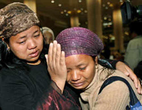 A newly arrived Jewish immigrant from India cries upon arrival at Ben Gurion International Airport near Tel Aviv. Reuters