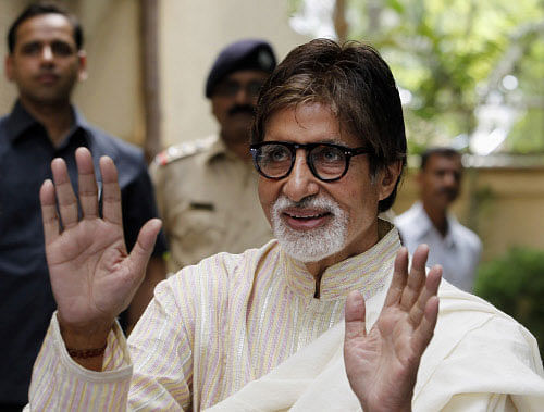 Bollywood actor Amitabh Bachchan waves as he greets his fans during a press conference on his 71st birthday in Mumbai AP file Photo