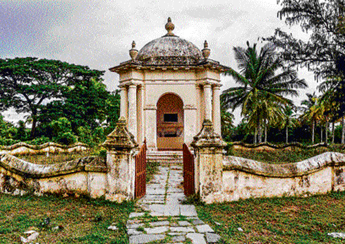 Home for the valiant: Set up seventeen years after Tipu Sultan's fall, the mausoleum of Col Baillie doesn't match the splendour of the Tiger of Mysore and his family's final resting place (inset). Yet, this neglected monument's stark simplicity brings to mind the conditions at the dungeon (below) maintained inside the fort, near Tipu's main palace. Photos by the author