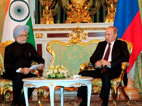 Prime Minister Manmohan Singh and Russian President Vladimir Putin at a meeting in Moscow on Monday. PTI Photo