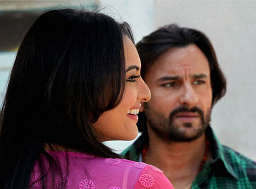 Bollywood actors Saif Ali Khan and Sonakshi Sinha shooting for Bullett Raja. PTI File Image