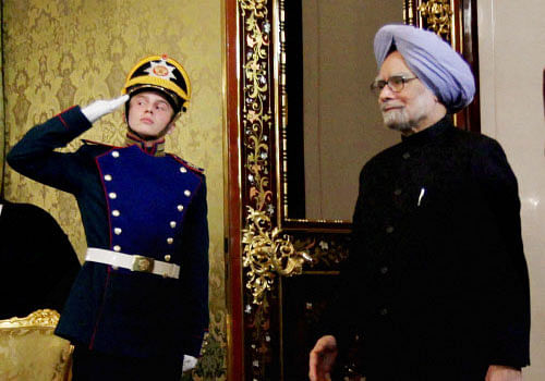 Prime Minister Manmohan Singh arrives for a meeting with Russian President Vladimir Putin in Moscow on Monday. PTI Photo