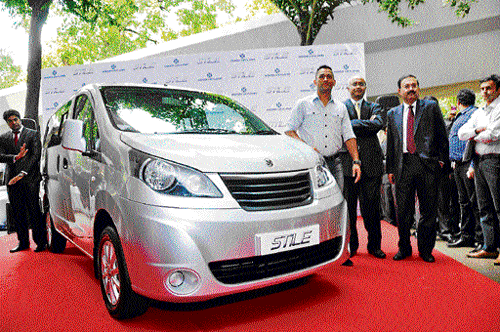 Indian cricket captain M S Dhoni (extreme left) at the launch Ashok Leyland Stile recently.