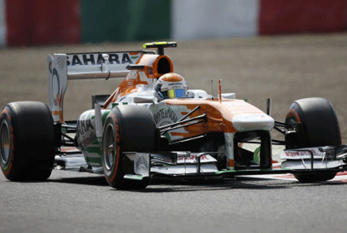 File Image: Force India Formula One driver Adrian Sutil of Germany drives during the third practice session of the Japanese F1 Grand Prix at the Suzuka circuit October 12, 2013. REUTERS