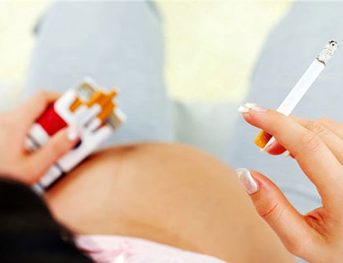Moms-to-be who smoke may significantly up their babies' risk of developing respiratory and other infections, a new study has warned. AP File Photo.