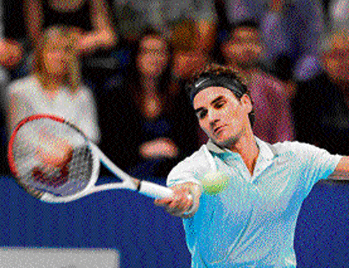 maestro Switzerland's Roger Federer in action against  Adrian Mannarino in the Basel Indoors on Monday. reuters