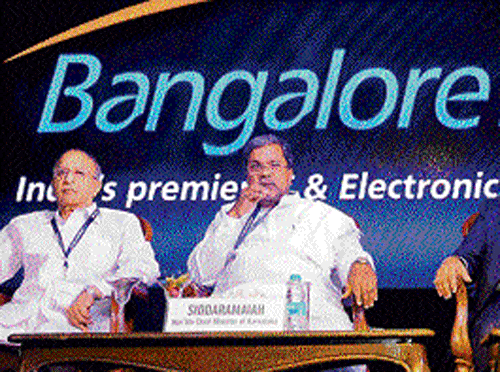 (From left) Union Minister for Science and Technology S Jaipal Reddy, Karnataka Chief Minister Siddaramaiah, Karnataka IT Minister S R Patil and Infosys Executive Vice-Chairman  S Gopalakrishnan at the inauguration of BangaloreITE.Biz on Monday. DH&#8200;Photo