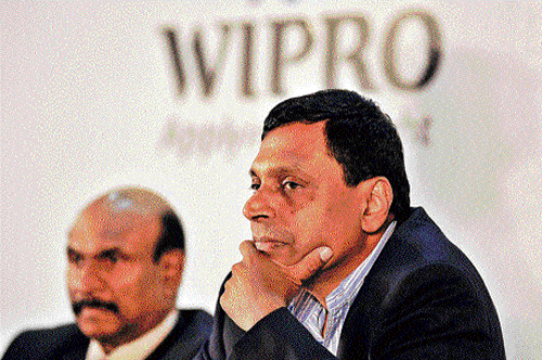 Wipro Chief Financial Officer Suresh Senapaty (left) and Chief Executive Officer T K Kurien announce the company's second quarter results in Bangalore on Tuesday. DH Photo
