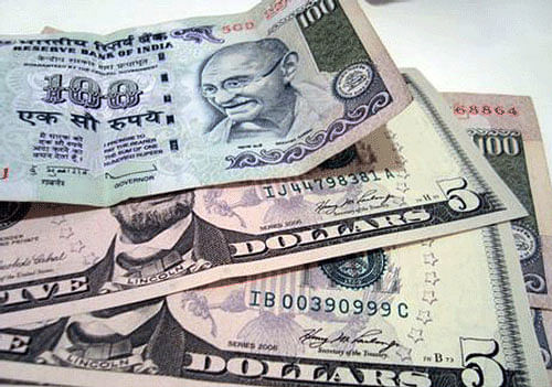 Rupee trims early gains vs dollar, still up 23 paise