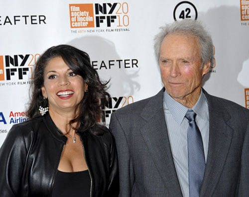 In this Oct. 10, 2010 file photo, director and producer Clint Eastwood, right, and wife Dina Eastwood attend the premiere of 'Hereafter' at Alice Tully Hall during the 48th New York Film Festival, in New York. Dina Eastwood filed for divorce after 17 years of marriage from her husband on Oct. 22, 2013, in Monterey, Calif., citing irreconcilable differences. (AP Photo/