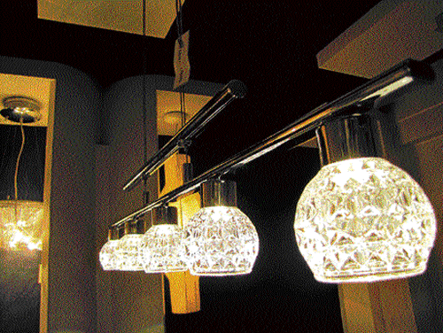 special effects These lighting fixtures, which incorporate crystals to stainless steel, can jazz up even a dull room. (photos by author)