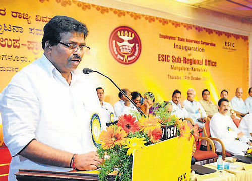 Minister of State for Labour and Employment Kodikunnil Suresh speaks after inaugurating the ESIC Sub-Regional office in Mangalore on Thursday. DH photo