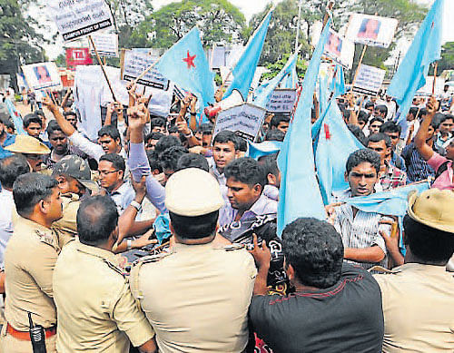 The police stop DK Campus Front of India members from gheraoing the DC's office, at a protest held on Thursday.