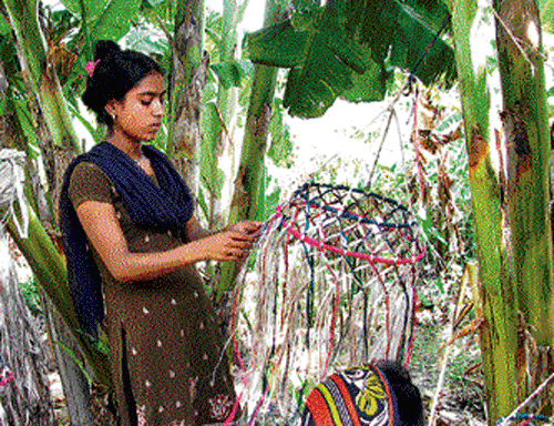Manowara Khatun, 14, makes a jute chika.