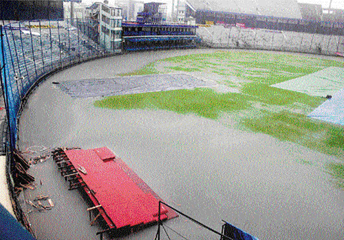 bleak future: The Barabati Stadium resembles a lake rather than a playing surface on the eve of the match. pti