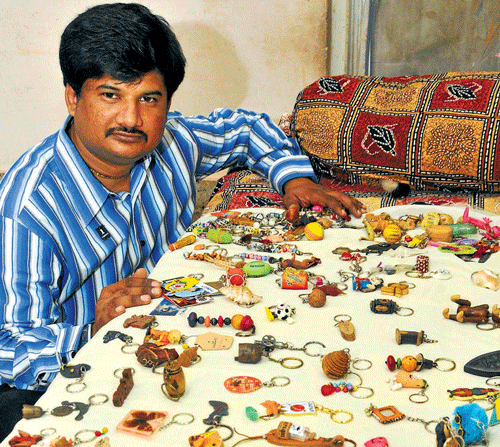 interesting: Ravi with some of his keychains. DH photos by BK Janardhan