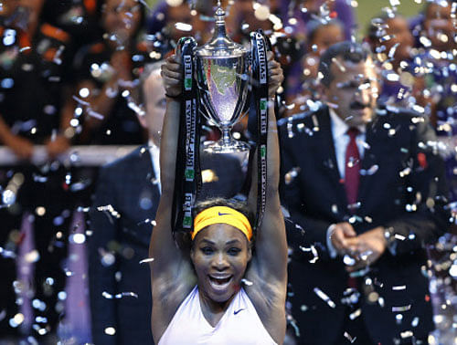 Serena Williams of the U.S. celebrates her victory against Li Na of China after their WTA tennis championships final match in Istanbul, October 27, 2013. REUTER