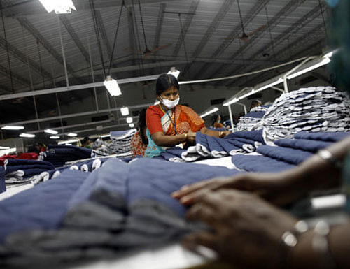 Employees sort pieces of cloth at the Estee garment factory in Tirupur. Reuters