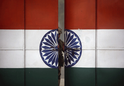 Indian and Pakistani troops are likely to hold a flag meeting on Monday to de-escalate tension. Reuters
